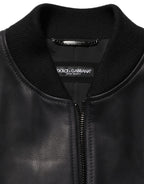 Black leather full-zip biker jacket for men by Dolce & Gabbana, featuring a stylish and fitted design with zip details and a high collar.