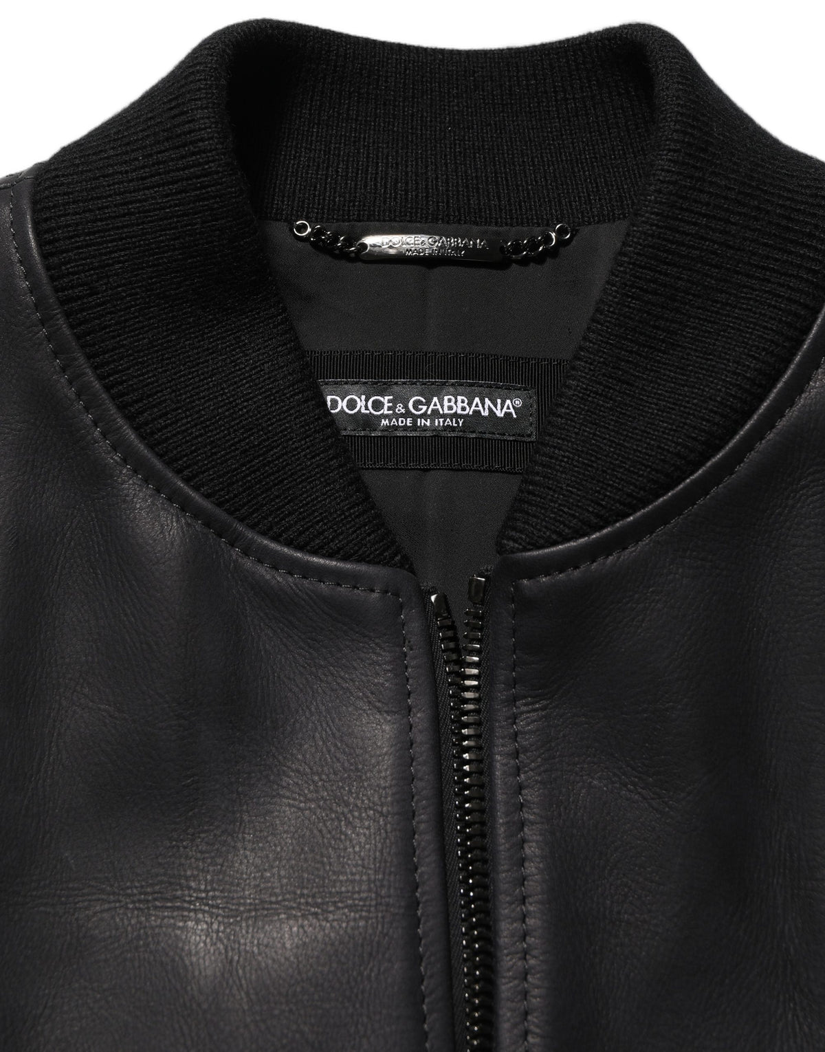 Black leather full-zip biker jacket for men by Dolce & Gabbana, featuring a stylish and fitted design with zip details and a high collar.