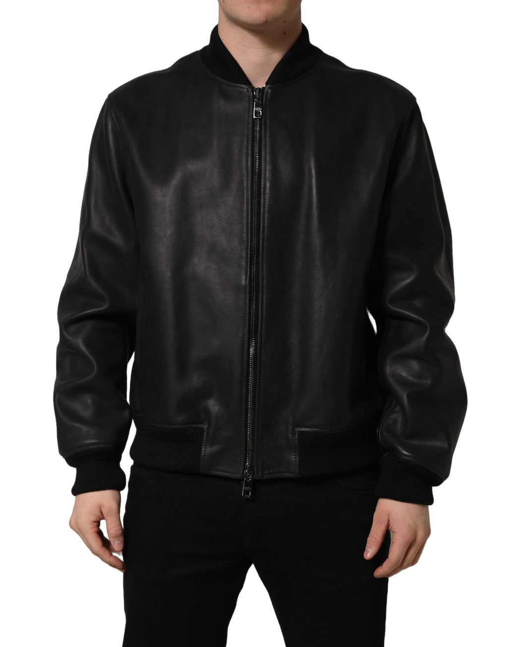 Black leather Dolce & Gabbana men's biker jacket with full zip and stylish design, shown on a hanger.
