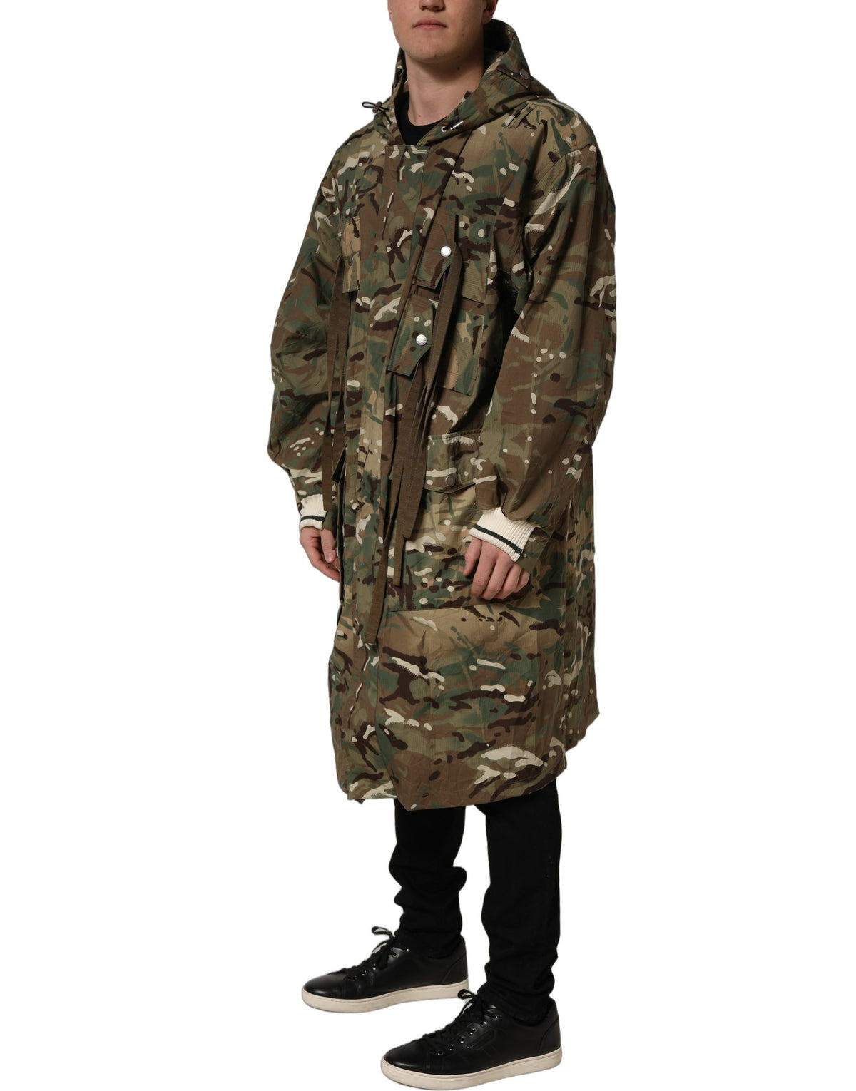 Dolce & Gabbana multicolor camouflage hooded coat jacket displayed on a model with a focus on the stylish camouflage pattern and hood.