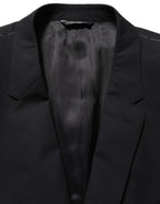 Dolce & Gabbana black wool blazer jacket with single-breasted design, tailored fit, and classic lapel style.