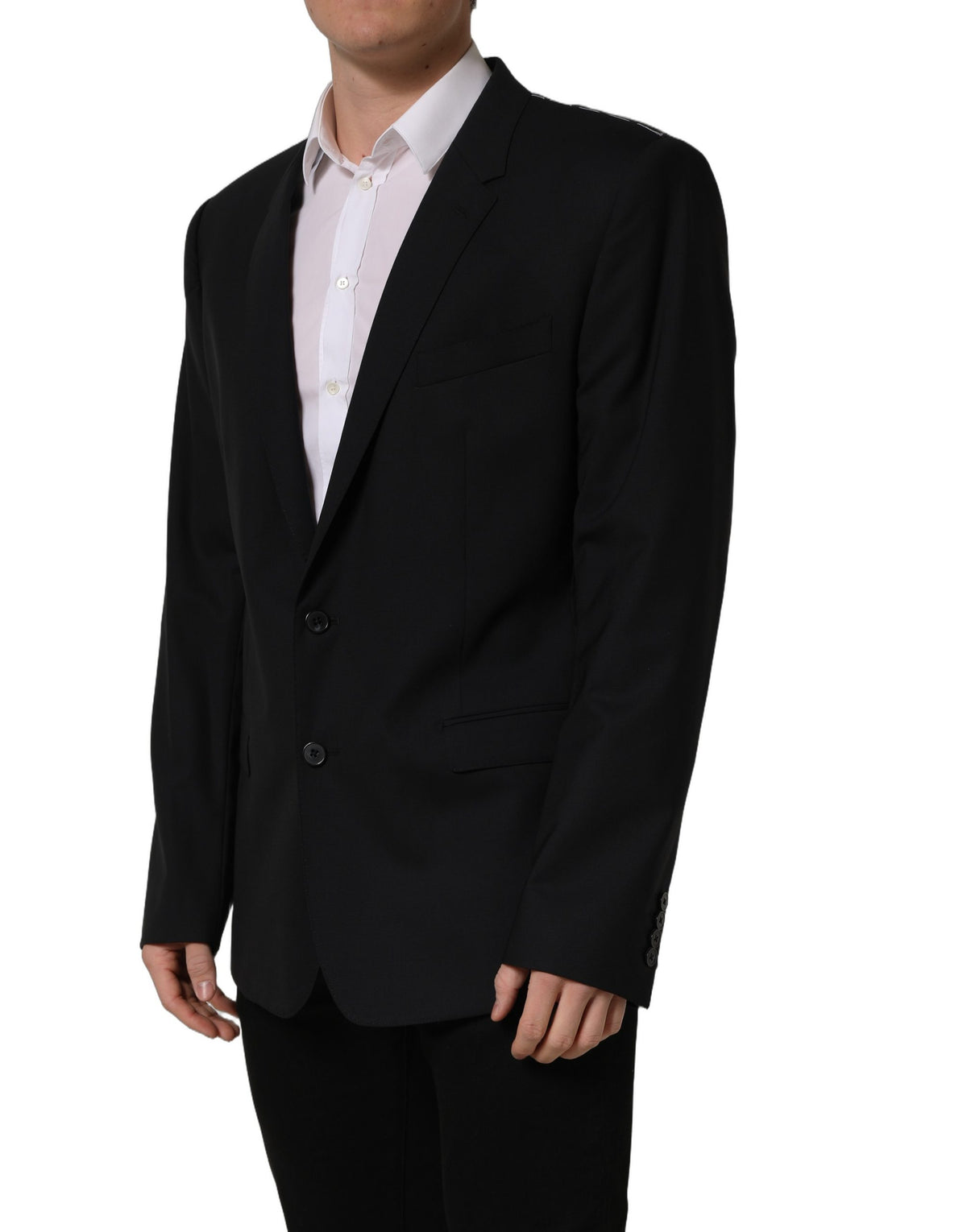 Dolce & Gabbana black wool single-breasted blazer jacket displayed on a hanger, showcasing tailored fit and classic design.