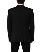 Dolce & Gabbana black wool blazer jacket with single-breasted design and notch lapel, tailored and stylish for men.