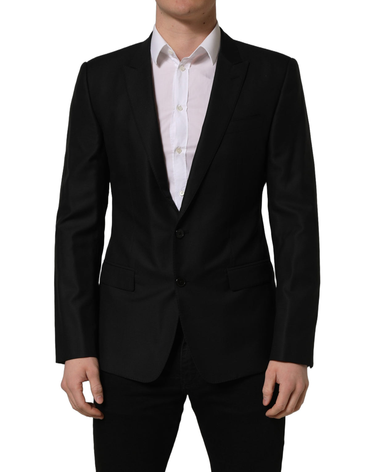 Black wool Dolce & Gabbana single-breasted blazer jacket with notch lapel and tailored fit, displayed on a hanger.