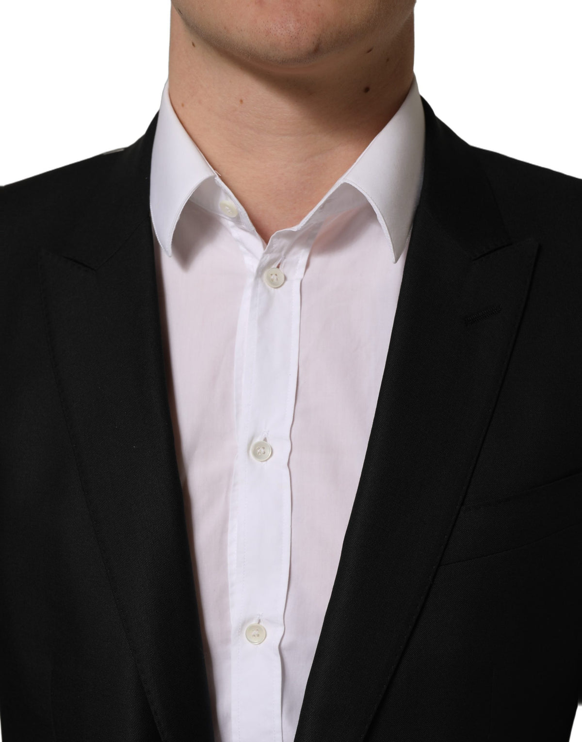 Dolce & Gabbana black wool blazer jacket featuring a single-breasted design and tailored fit, displayed on a mannequin.