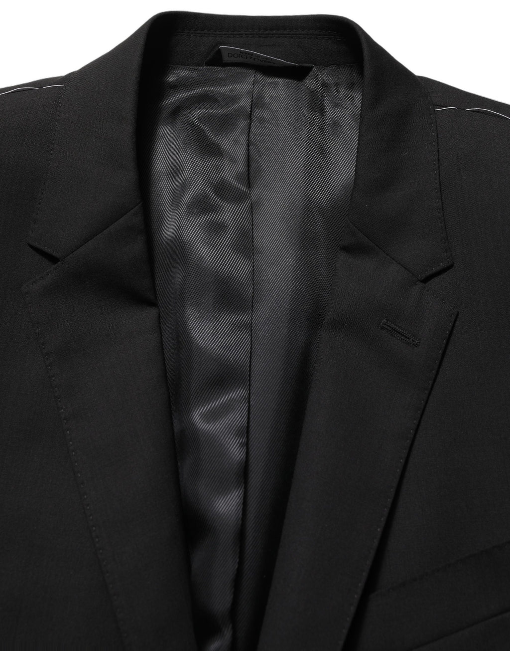 Dolce & Gabbana black wool single-breasted blazer jacket displayed on a hanger, showcasing tailored fit and classic style.