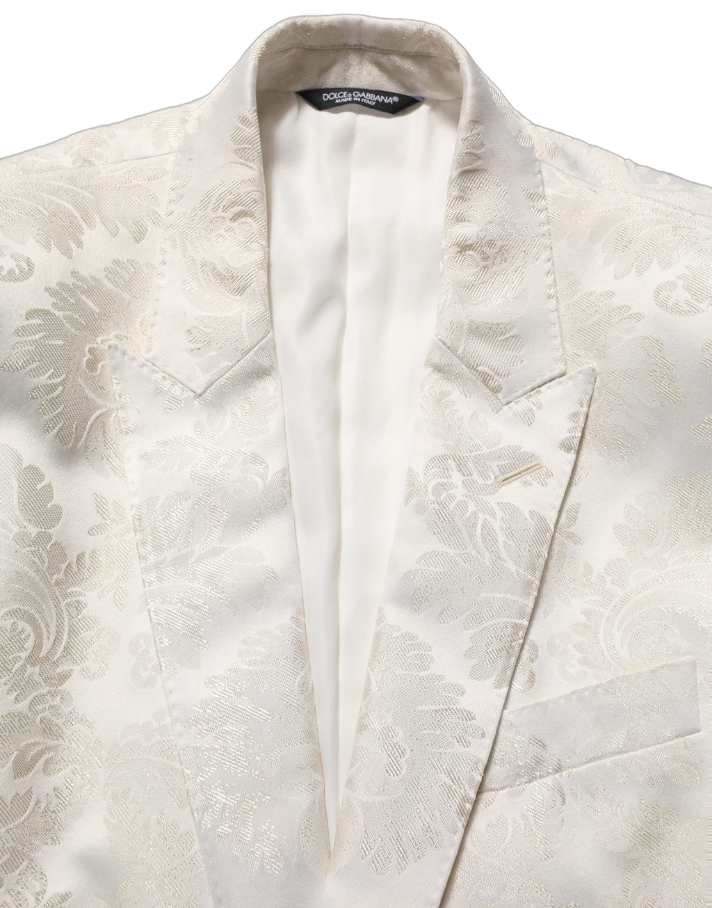 Dolce & Gabbana men's off-white floral single-breasted jacket displayed on a hanger, featuring a tailored fit and floral pattern.