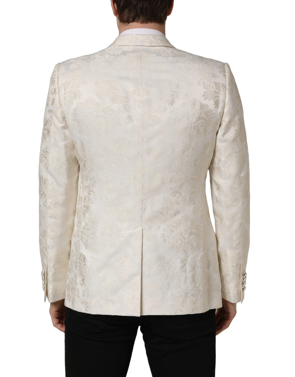 Dolce & Gabbana men's off-white floral single-breasted jacket displayed on a hanger. Elegant design with floral pattern and tailored fit.