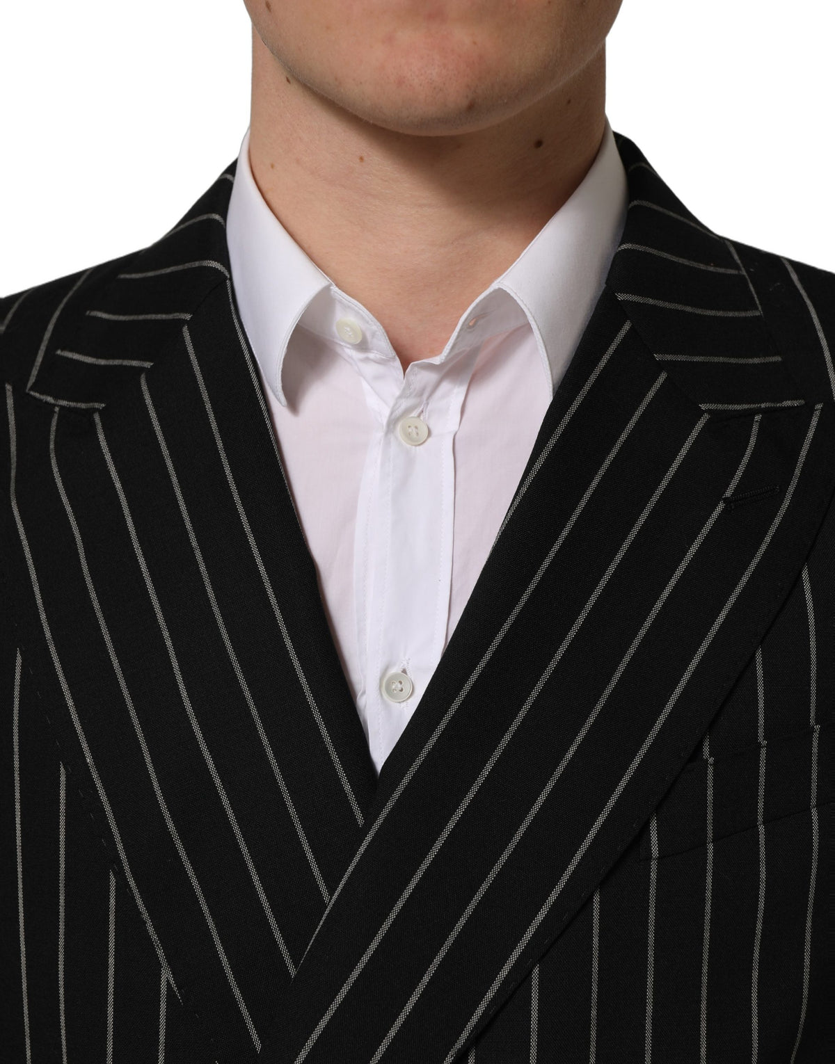 Dark gray striped wool double-breasted jacket by Dolce & Gabbana, featuring classic lapels and button closures.