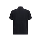 Premiata black cotton polo shirt with a classic collar and short sleeves, displayed on a hanger.