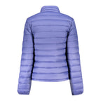 North Sails blue polyester women's jacket displayed on a hanger, showcasing a sleek, lightweight outerwear design.