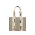 Chloé beige linen handbag with leather handles and gold hardware, showcasing a stylish and elegant accessory.