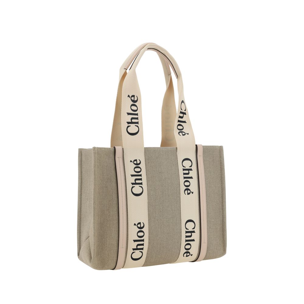 Chloé beige linen handbag with leather straps and gold hardware, stylish accessory for casual or elegant outfits.