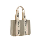 Chloé beige linen handbag with leather straps and gold hardware, stylish accessory for casual or elegant outfits.