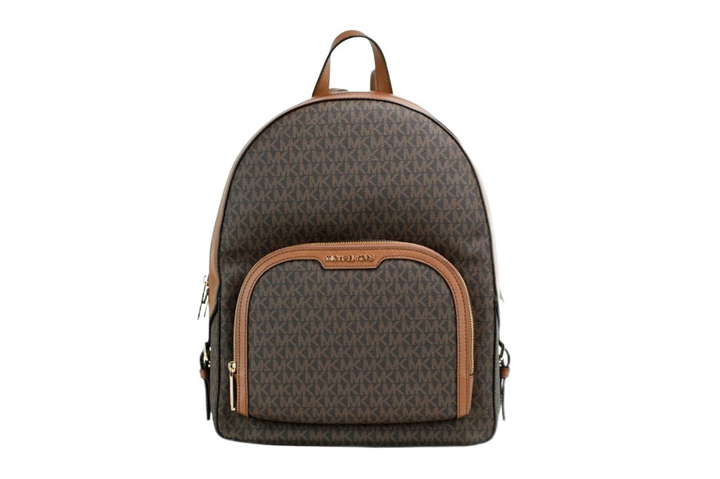 Michael Kors Jaycee large brown signature PVC shoulder backpack with adjustable straps and spacious interior.