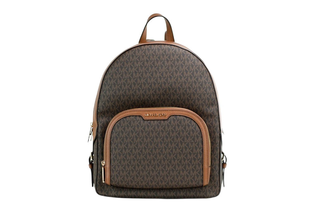 Michael Kors Jaycee large brown signature PVC shoulder backpack with adjustable straps and spacious interior.