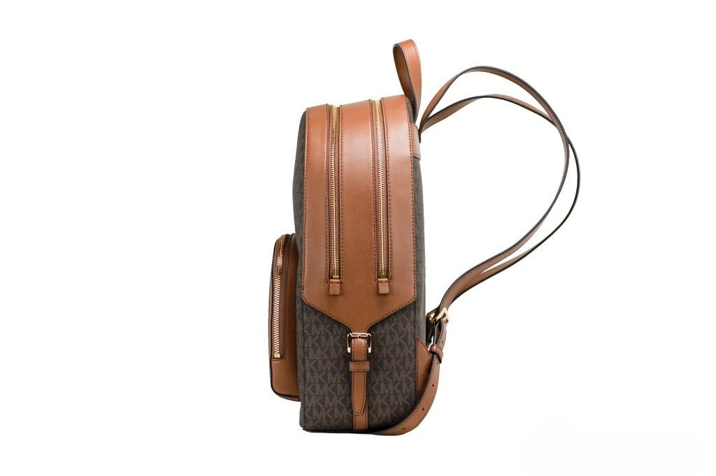 Michael Kors Jaycee large brown signature PVC shoulder backpack with top handle and adjustable straps.