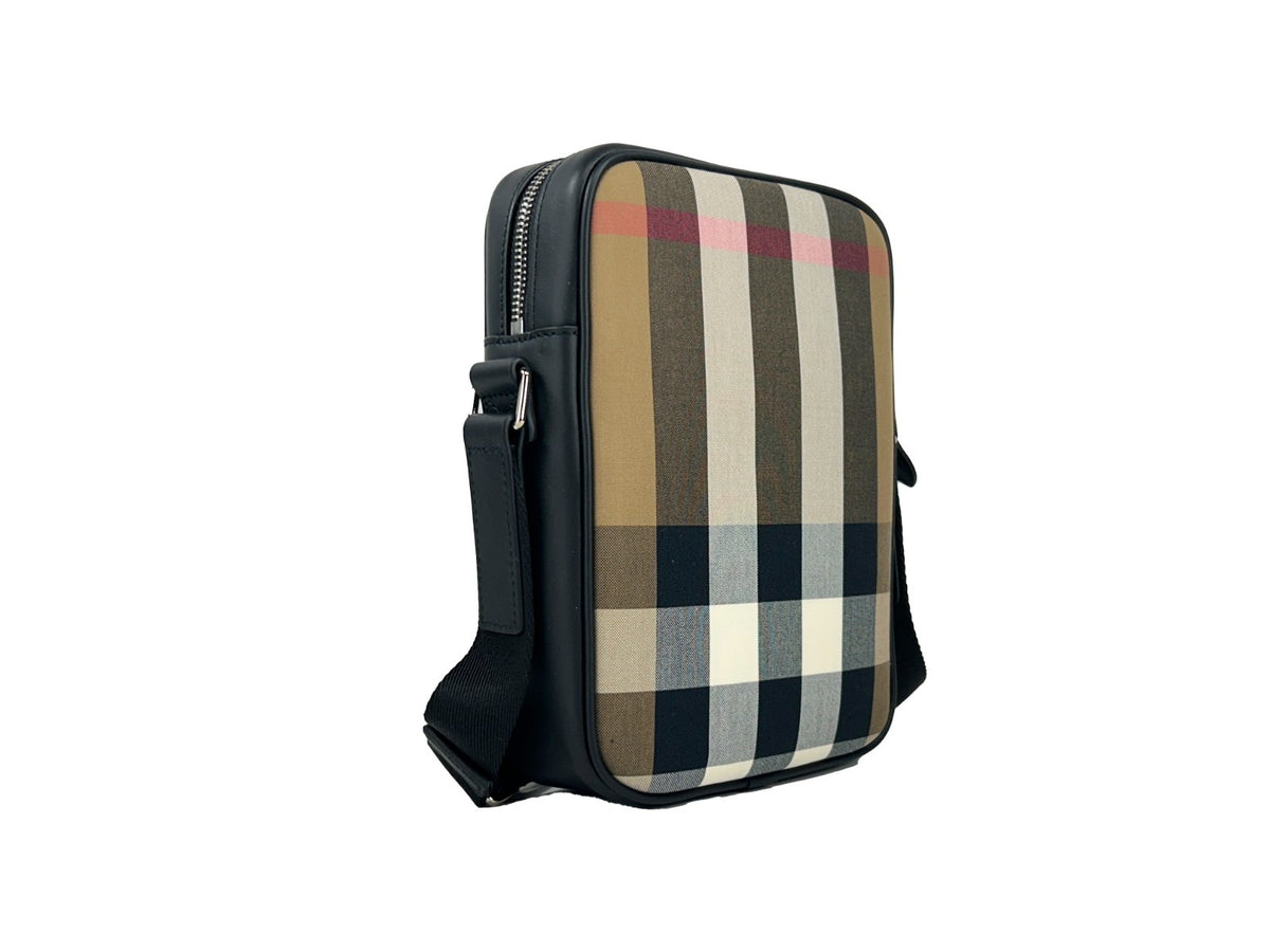Burberry Paddy Check crossbody bag with beige, black, and red check pattern, leather strap, and gold-tone hardware.