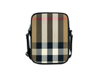 Burberry Paddy Check crossbody bag with beige and black check pattern, leather strap, and gold-tone hardware.