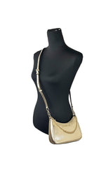 Michael Kors small pouchette crossbody bag in black leather with gold hardware and adjustable strap on a plain background.