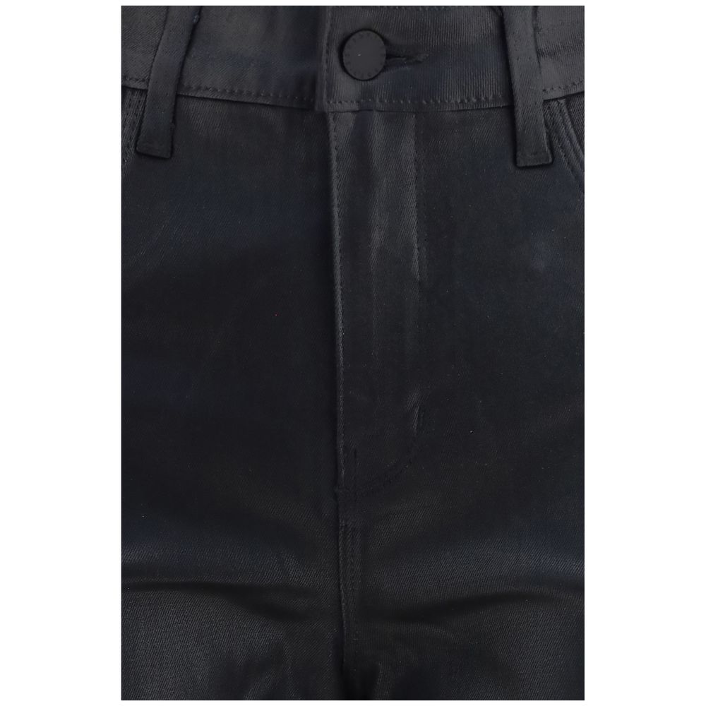 Black leather pants by L'Agence, showing close-up of sleek, fitted design and smooth leather texture.