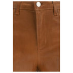 L'Agence beige cotton denim jeans with classic five-pocket design and slim fit cut, displayed on a neutral background.
