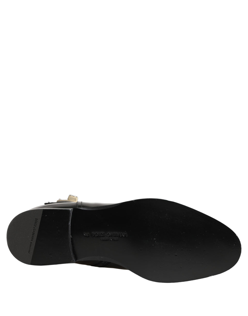 Black leather Dolce & Gabbana mid-calf boots with logo buckle detail, stylish and sleek footwear for women.