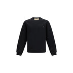 Valentino Garavani black cotton sweatshirt featuring a relaxed fit and minimalist design, ideal for casual wear.