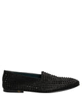 Black Dolce & Gabbana loafers with rhinestone embellishments, featuring a sleek design and classic slip-on style.