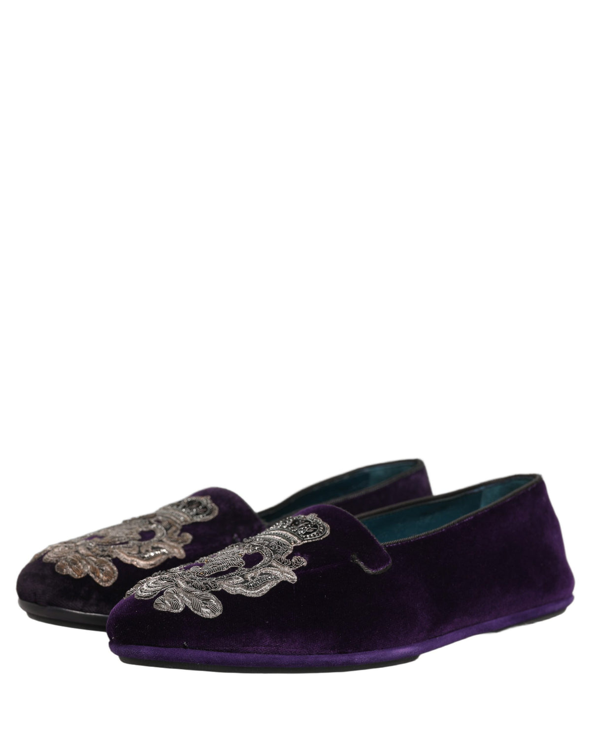 Dolce & Gabbana purple velvet loafers with crown embroidery, featuring a sleek design and elegant craftsmanship.