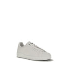Dolce & Gabbana white calf leather Bos Taurus low top sneakers with sleek design and subtle branding.