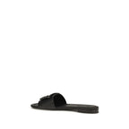 Fendi black calf leather Bos Taurus flat sandals with open toe and ankle strap, stylish and comfortable footwear.