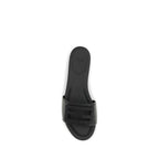 Fendi black calf leather Bos Taurus flat sandals with open toe design and ankle strap, stylish and comfortable for warm weather.