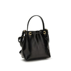 Balmain black calf leather Bos Taurus bucket bag with gold-tone hardware and adjustable strap.