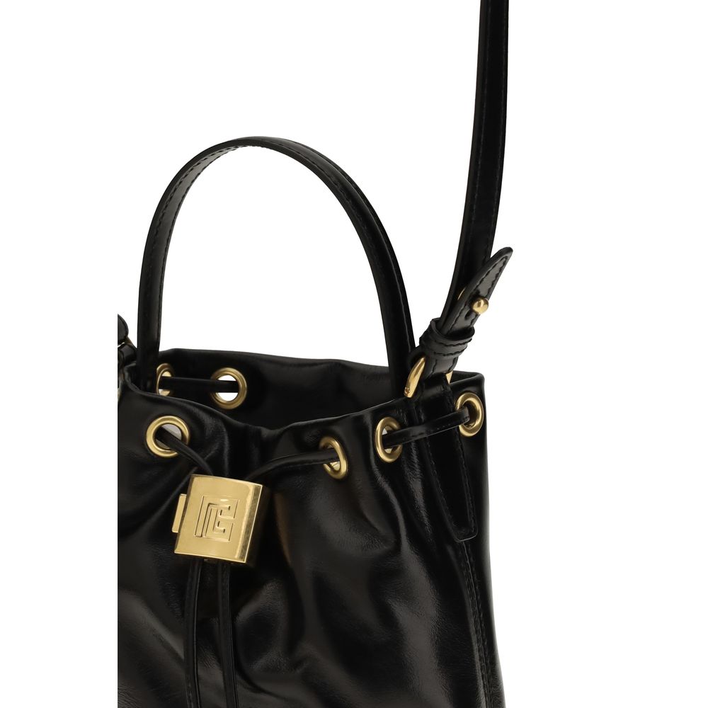 Balmain black calf leather Bos Taurus backpack bag with silver hardware and adjustable straps on a plain background.