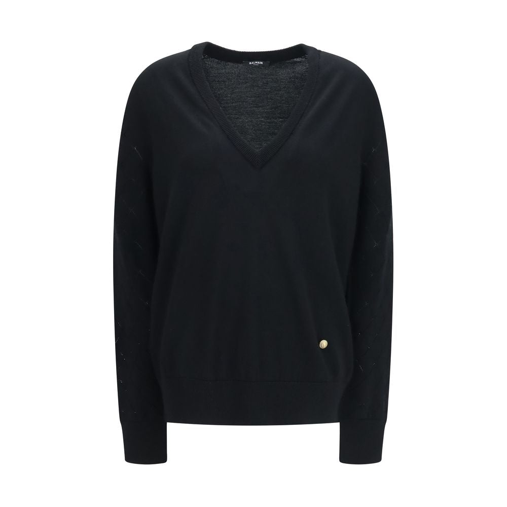 Balmain black wool oversized Aries sweatshirt with bold graphic design and ribbed cuffs, perfect for casualwear.
