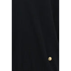 Balmain black wool oversized Aries sweatshirt with ribbed cuffs and neckline, displayed on a hanger.