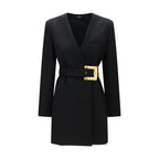 Balmain black wool blazer featuring a tailored fit and classic lapel, displayed on a hanger against a neutral background.