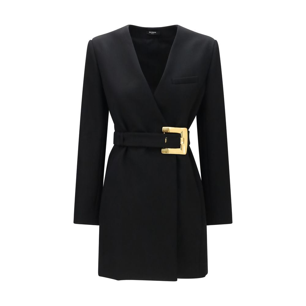 Balmain black wool blazer featuring a tailored fit and classic lapel, displayed on a hanger against a neutral background.