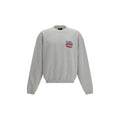 Represent gray cotton sweatshirt with a relaxed fit, featuring a crew neckline and minimal branding, displayed on a hanger.