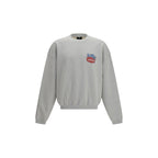 Represent gray cotton sweatshirt with a relaxed fit, featuring a crew neckline and minimal branding, displayed on a hanger.