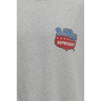 Represent gray cotton sweatshirt with a relaxed fit, featuring a crew neckline and minimal branding, displayed on a flat surface.