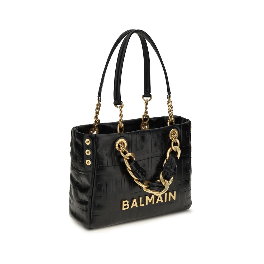 Balmain black calf leather Bos Taurus shoulder bag with gold-tone hardware and structured design.