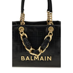 Balmain black calf leather Bos Taurus shoulder bag with gold-tone hardware and structured design.