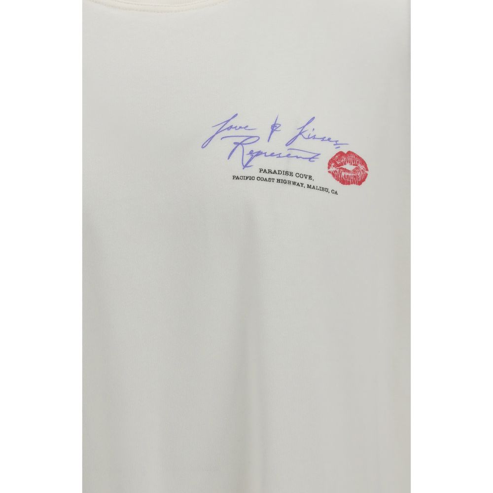 White cotton T-shirt by Represent, featuring a classic fit and minimal design, displayed flat on a white background.