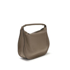 Chloé beige calf leather Bos Taurus shoulder bag with gold-tone hardware and adjustable strap on a plain background.