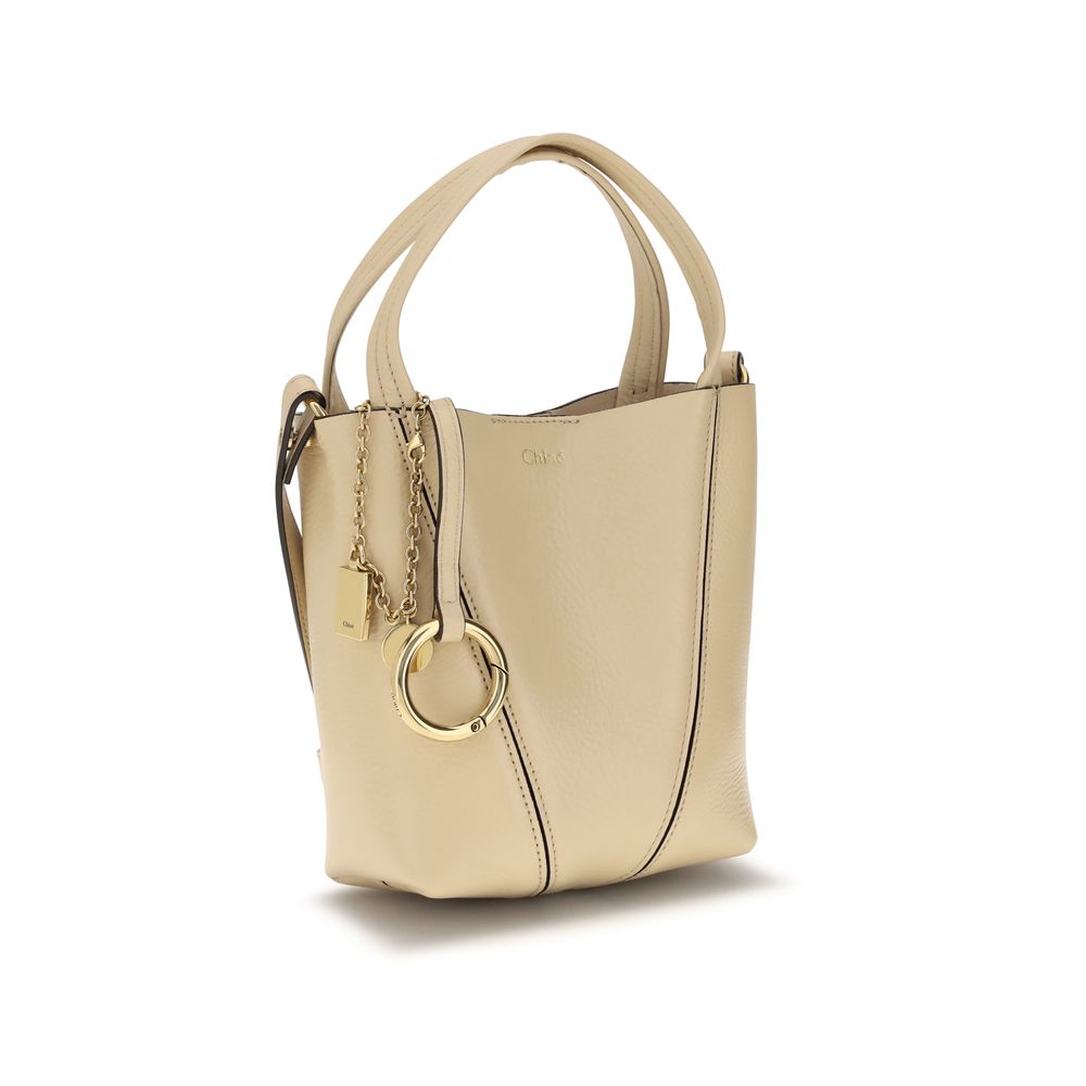 Chloé beige calf leather Bos Taurus shoulder bag with gold hardware and adjustable strap, stylish and elegant accessory.