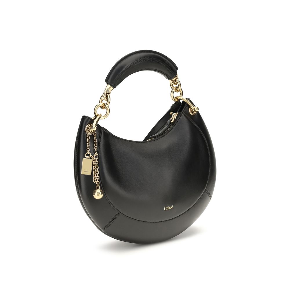 Chloé black calf leather Bos Taurus shoulder bag with silver hardware and adjustable strap, stylish and elegant accessory.