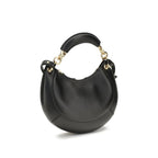 Chloé Bos Taurus shoulder bag in black calf leather with gold-tone hardware and adjustable shoulder strap.