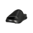Norway 1963 black polyurethane men's slipper with a slip-on design and cushioned sole for comfortable indoor wear.